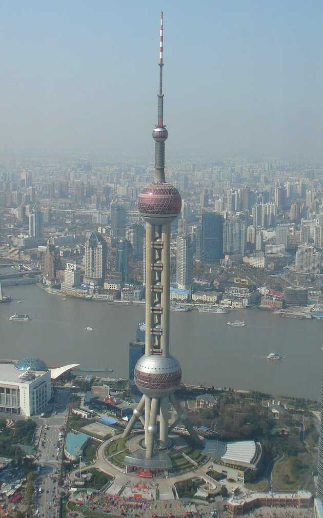 Фото Телебашни «Восточная жемчужина» в Шанхае, Китай Большая галерея качественных и красивых фотографий Телебашни «Восточная жемчужина», которые Вы можете смотреть на нашем сайте
